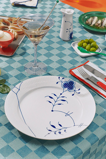A Colorful table set with Blue Fluted Mega